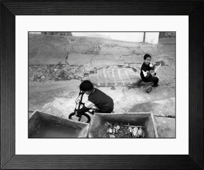 Framed Print : Small boys playing in the street, Malaga, Spain Framed Print : Small boys playing in the street, Malaga, Spain
