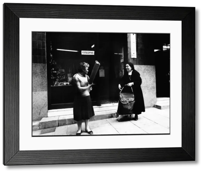 Framed Print : Street meeting with nun, Valencia, Spain Framed Print : Street meeting with nun, Valencia, Spain