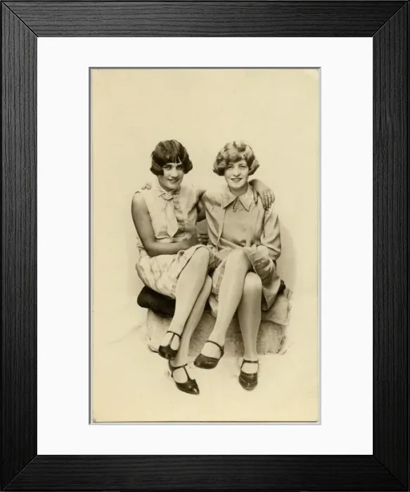 Framed Print : Two close lady friends in stylish attire Framed Print : Two close lady friends in stylish attire