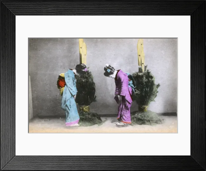 Framed Print : Two Japanese women greet each other with a bow Framed Print : Two Japanese women greet each other with a bow