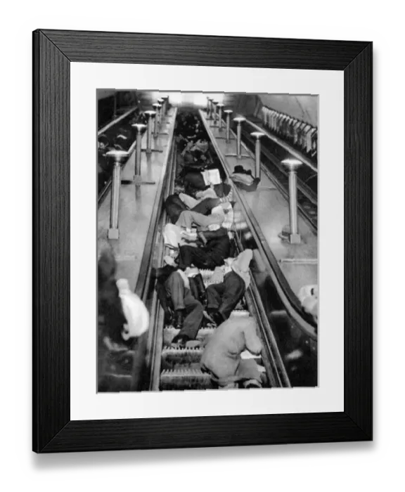 Framed Print : Taking Shelter in Piccadilly Circus Underground Station Framed Print : Taking Shelter in Piccadilly Circus Underground Station
