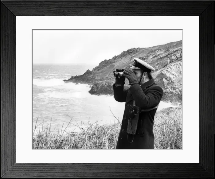 Framed Print : Auxiliary coastguard with binoculars, West Country Framed Print : Auxiliary coastguard with binoculars, West Country