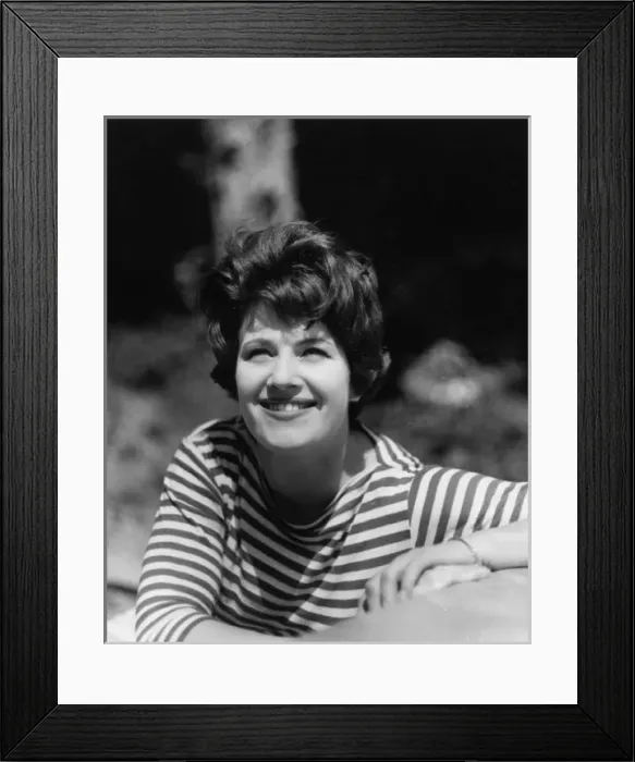Framed Print : Woman relaxing in stripy top Framed Print : Woman relaxing in stripy top