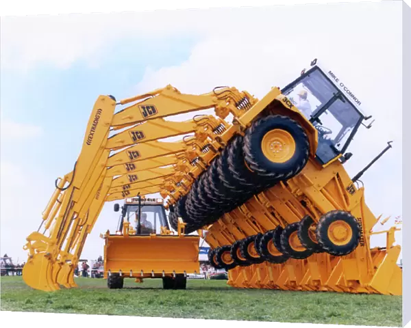 Display of JCB Extradig diggers in a field