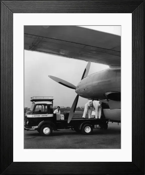 Framed Print : Loading a plane at Jersey Airport, Channel Islands Framed Print : Loading a plane at Jersey Airport, Channel Islands