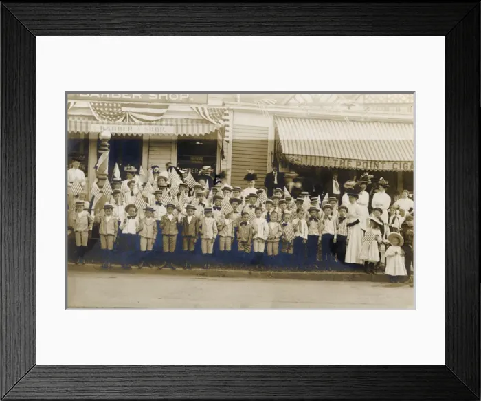 Framed Print : Group of adults and children with flags, USA Framed Print : Group of adults and children with flags, USA