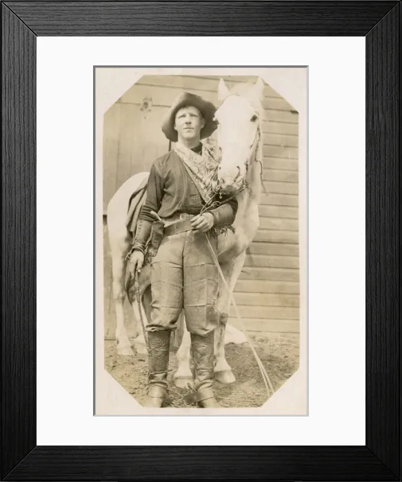 Framed Print : City cowboy with his white horse, USA Framed Print : City cowboy with his white horse, USA