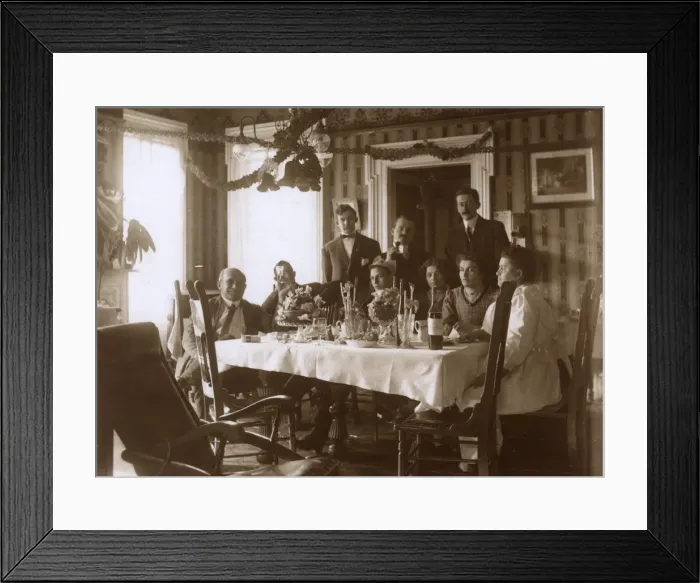 Framed Print : People at a table for a Christmas meal, USA Framed Print : People at a table for a Christmas meal, USA