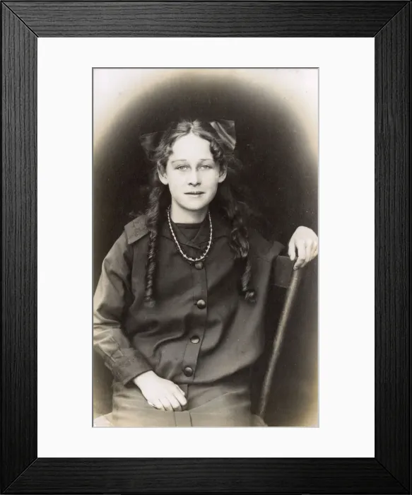Framed Print : Young woman with ringlets and bow, USA Framed Print : Young woman with ringlets and bow, USA
