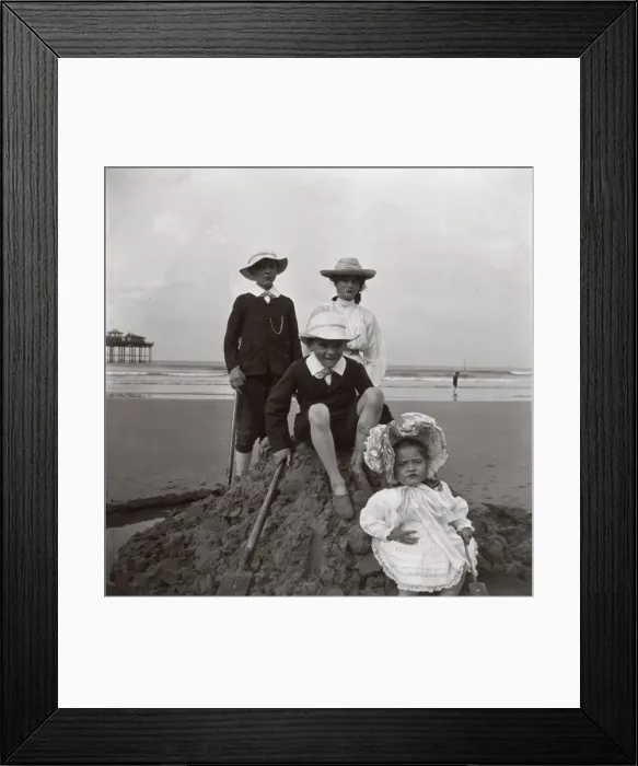 Framed Print : Four children on a sandcastle, Saltburn, North Yorkshire Framed Print : Four children on a sandcastle, Saltburn, North Yorkshire