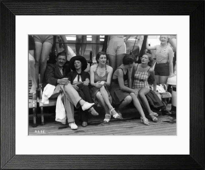 Framed Print : People in leisurewear and swimwear on board ship Framed Print : People in leisurewear and swimwear on board ship