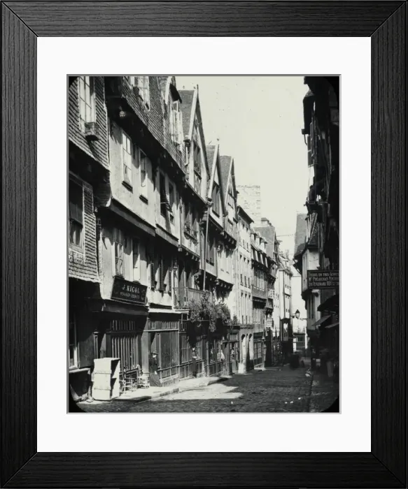 Framed Print : Morlaix - black and white view along street with houses and shops Date: circa 1890s Framed Print : Morlaix - black and white view along street with houses and shops Date: circa 1890s
