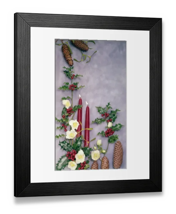 Framed Print : Christmas arrangement of candles, flowers and holly Framed Print : Christmas arrangement of candles, flowers and holly