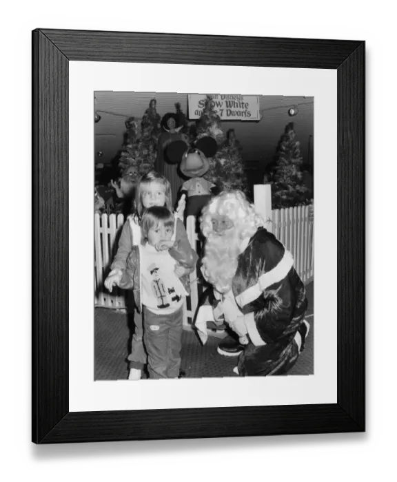 Framed Print : Father Christmas with children in his grotto Framed Print : Father Christmas with children in his grotto