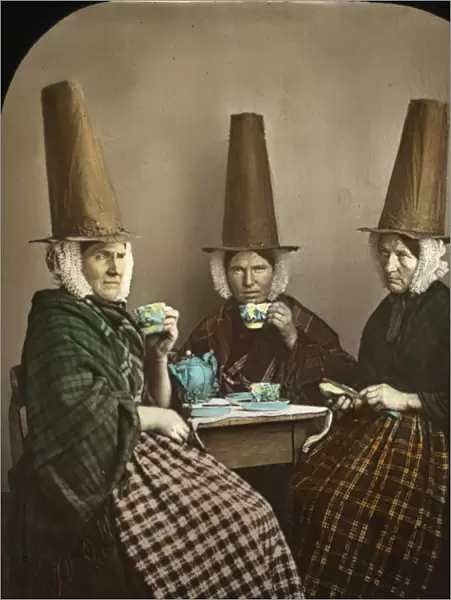 Group of three Welsh women in traditional costume