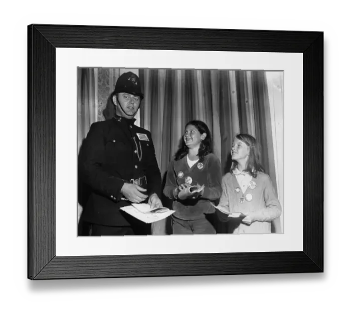 Framed Print : Policeman in 1920s uniform, with two girls Framed Print : Policeman in 1920s uniform, with two girls