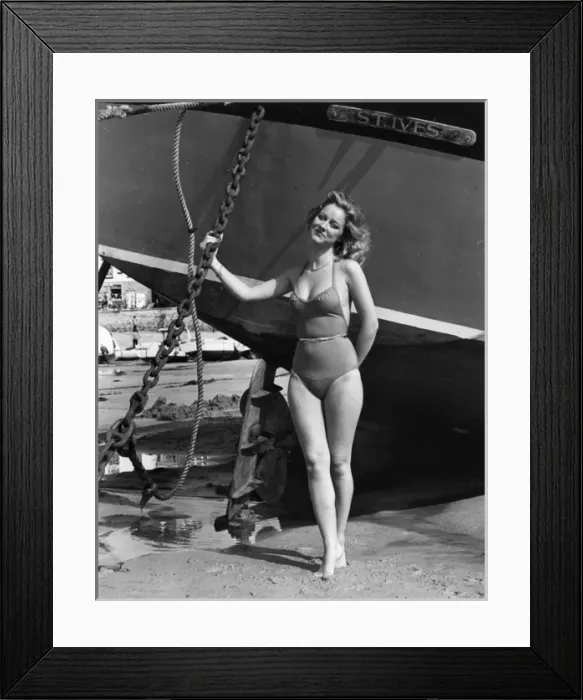 Framed Print : Model on beach with fishing boat, St Ives, Cornwall Framed Print : Model on beach with fishing boat, St Ives, Cornwall