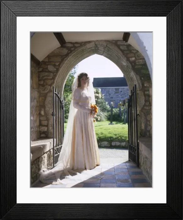 Framed Print : Bride in church porch, Marazion, Cornwall Framed Print : Bride in church porch, Marazion, Cornwall