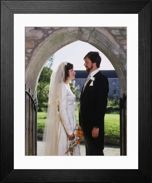 Framed Print : Bride and groom in church doorway, Marazion, Cornwall Framed Print : Bride and groom in church doorway, Marazion, Cornwall
