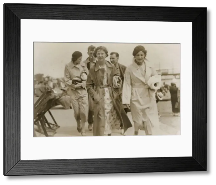 Framed Print : Paignton, Devon - Group of young folk at the seaside Framed Print : Paignton, Devon - Group of young folk at the seaside