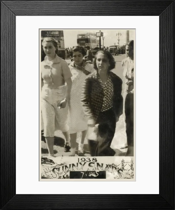Framed Print : Four young women at the British seaside - walking past Framed Print : Four young women at the British seaside - walking past