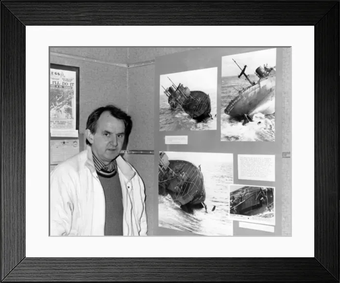 Framed Print : Andrew Besley, photographer, at an exhibition Framed Print : Andrew Besley, photographer, at an exhibition