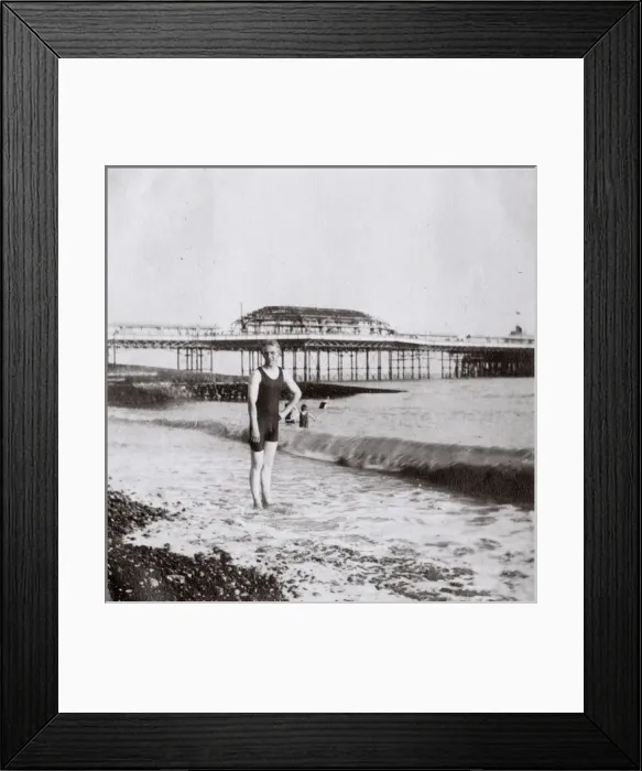 Framed Print : Young man on the beach, Brighton, Sussex Framed Print : Young man on the beach, Brighton, Sussex