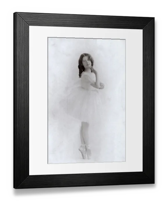 Framed Print : Young ballerina in a studio photo Framed Print : Young ballerina in a studio photo