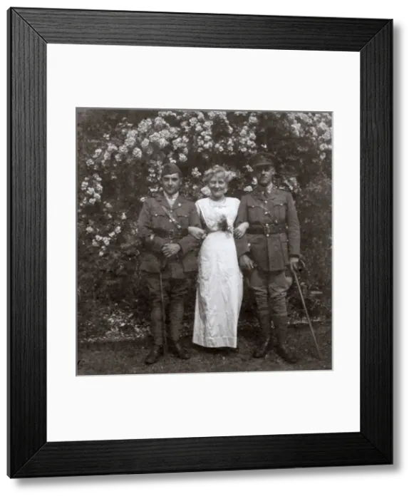 Framed Print : Mother and two sons in a garden, WW1 Framed Print : Mother and two sons in a garden, WW1