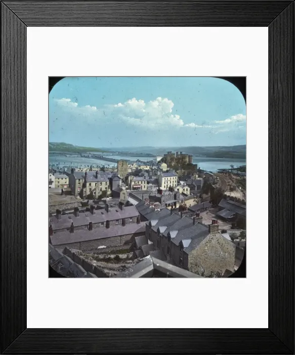 Framed Print : Conwy. Colour lantern slide featuring image looking over many buildings Framed Print : Conwy. Colour lantern slide featuring image looking over many buildings