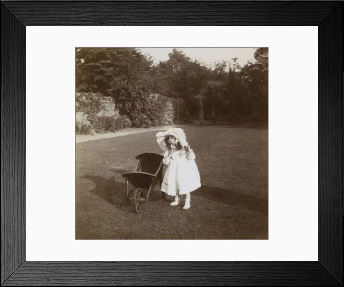 Framed Print : Little girl in garden, Ealing, West London Framed Print : Little girl in garden, Ealing, West London