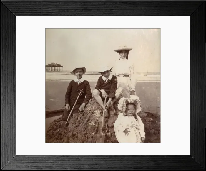 Framed Print : Four children on a sandcastle, Saltburn, North Yorkshire Framed Print : Four children on a sandcastle, Saltburn, North Yorkshire