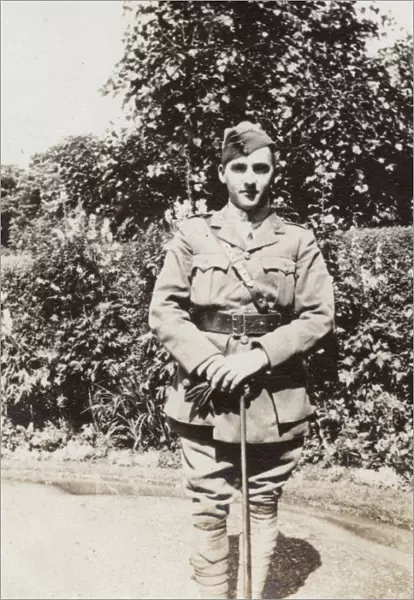 Soldier in a garden, WW1