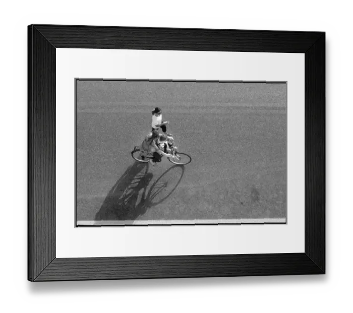Framed Print : Cyclist viewed from above, Italy Framed Print : Cyclist viewed from above, Italy