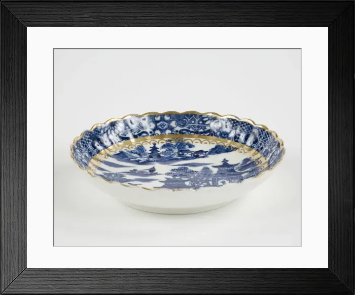 Framed Print : Saucer made from porcelain, transfer-printed in underglaze blue with the Framed Print : Saucer made from porcelain, transfer-printed in underglaze blue with the