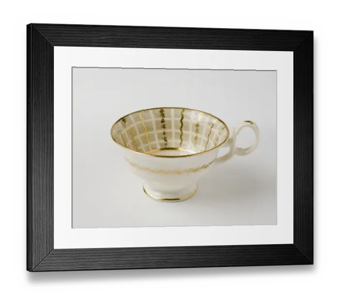 Framed Print : Teacup. Glazed porcelain tea cup from a tea service Framed Print : Teacup. Glazed porcelain tea cup from a tea service