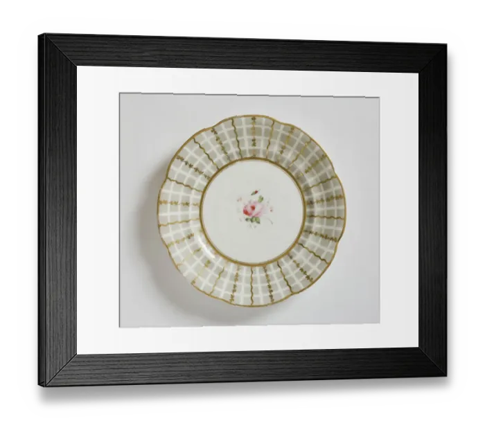 Framed Print : Plate. Glazed porcelain plate with scalloped edges Framed Print : Plate. Glazed porcelain plate with scalloped edges