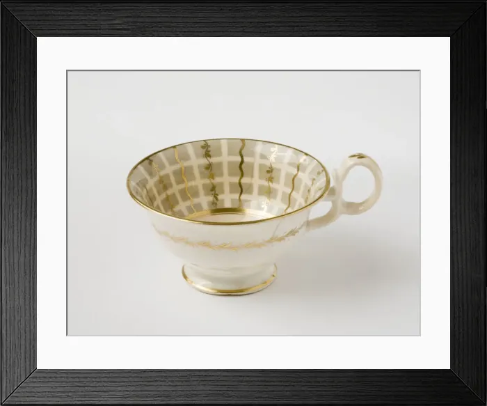 Framed Print : Teacup. Glazed porcelain tea cup from a tea service Framed Print : Teacup. Glazed porcelain tea cup from a tea service