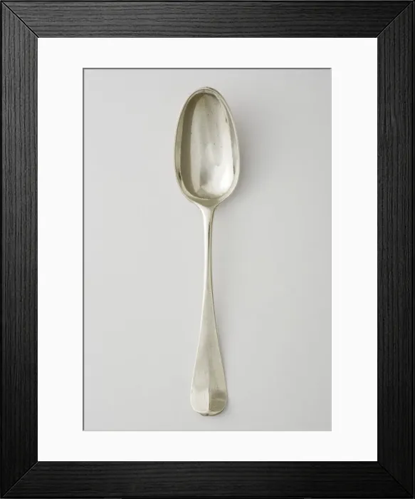 Framed Print : Teaspoon. Silver teaspoon with an upturned handle Framed Print : Teaspoon. Silver teaspoon with an upturned handle