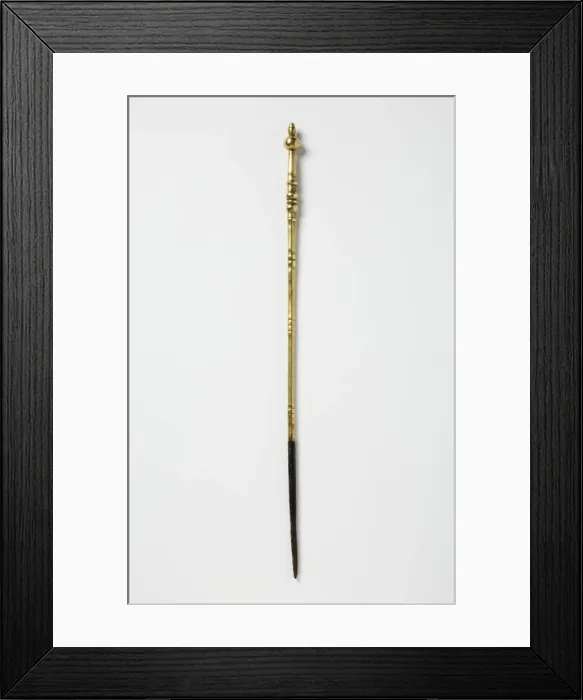 Framed Print : Poker. Brass and wrought iron poker with a turned shaft featuring three knops Framed Print : Poker. Brass and wrought iron poker with a turned shaft featuring three knops