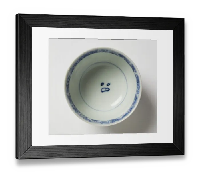 Framed Print : Tea bowl. Porcelain tea bowl with cobalt blue underglaze decoration of three figures Framed Print : Tea bowl. Porcelain tea bowl with cobalt blue underglaze decoration of three figures
