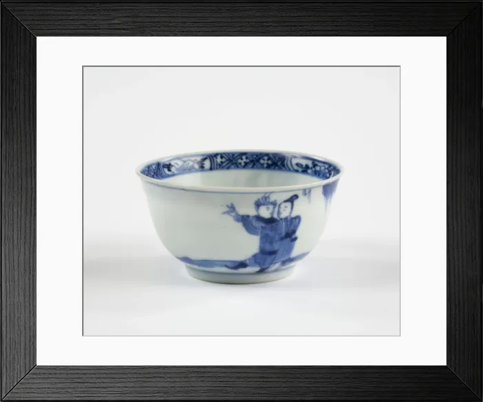Framed Print : Tea bowl. Porcelain tea bowl with cobalt blue underglaze decoration of three figures Framed Print : Tea bowl. Porcelain tea bowl with cobalt blue underglaze decoration of three figures