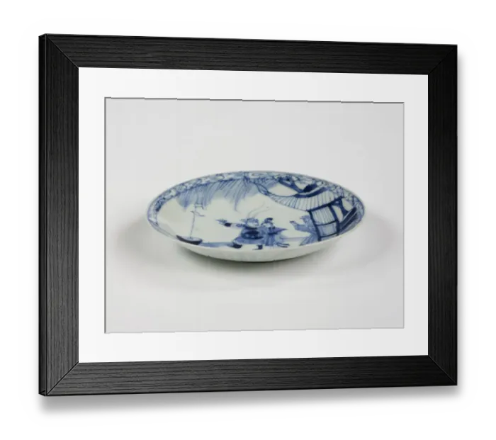 Framed Print : Saucer. Porcelain saucer with cobalt blue underglaze decoration of three figures Framed Print : Saucer. Porcelain saucer with cobalt blue underglaze decoration of three figures