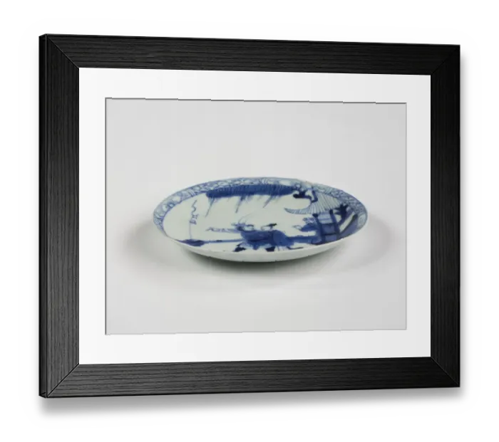 Framed Print : Saucer. Porcelain saucer with cobalt blue underglaze decoration of three figures Framed Print : Saucer. Porcelain saucer with cobalt blue underglaze decoration of three figures