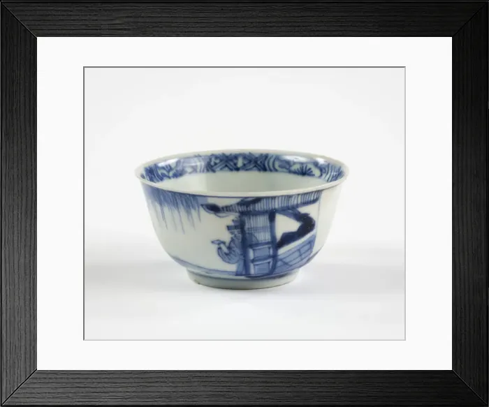 Framed Print : Tea bowl. Porcelain tea bowl with cobalt blue underglaze decoration of three figures Framed Print : Tea bowl. Porcelain tea bowl with cobalt blue underglaze decoration of three figures
