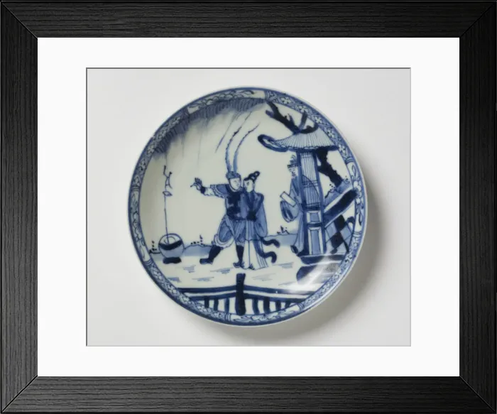 Framed Print : Saucer. Porcelain saucer with cobalt blue underglaze decoration of three figures Framed Print : Saucer. Porcelain saucer with cobalt blue underglaze decoration of three figures