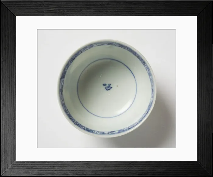 Framed Print : Tea bowl. Porcelain tea bowl with cobalt blue underglaze decoration of three figures Framed Print : Tea bowl. Porcelain tea bowl with cobalt blue underglaze decoration of three figures