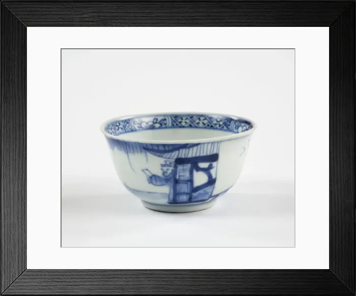 Framed Print : Tea bowl. Porcelain tea bowl with cobalt blue underglaze decoration of three figures Framed Print : Tea bowl. Porcelain tea bowl with cobalt blue underglaze decoration of three figures