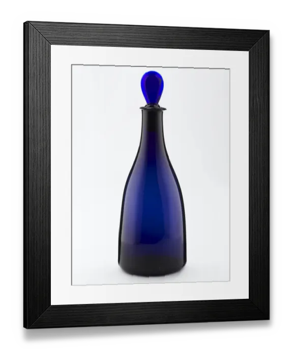 Framed Print : Decanter of tapered form made from blown and bevelled blue glass Framed Print : Decanter of tapered form made from blown and bevelled blue glass