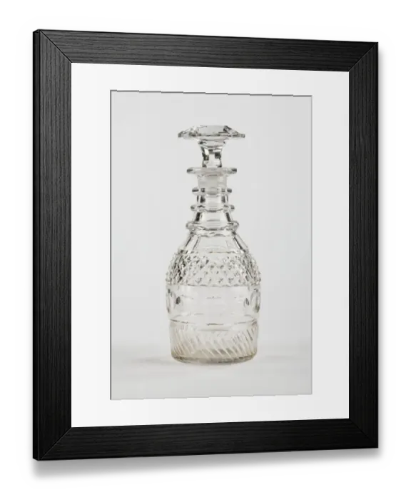 Framed Print : Decanter. Half-size decanter with rings around the neck Framed Print : Decanter. Half-size decanter with rings around the neck